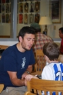 Tutor and child at library